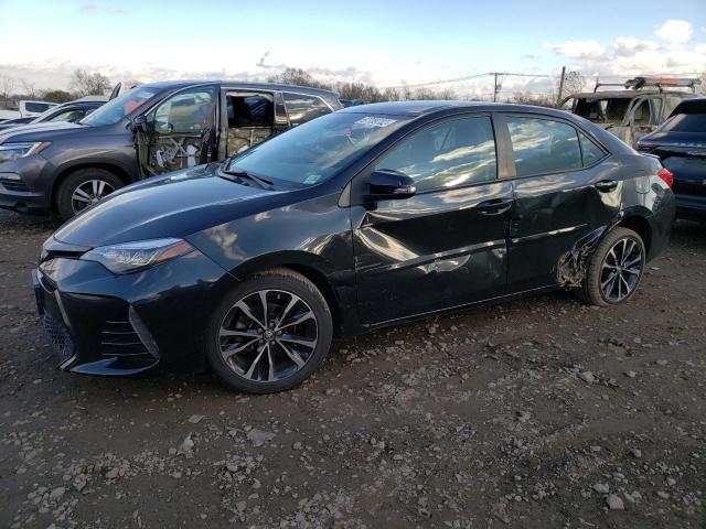 TOYOTA COROLLA L 2018 with VIN 2T1BURHE5JC986036 - Photo from auction