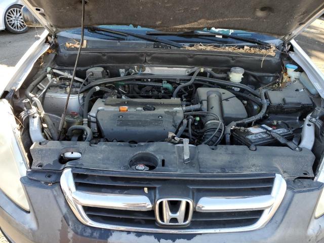 Photo 11 from auction – 2004 HONDA CR-V LX with VIN JHLRD68414C015023