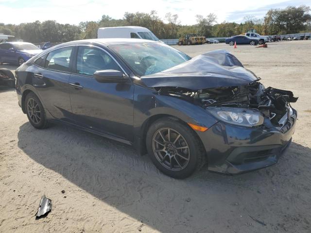 Photo 4 from auction – 2017 HONDA CIVIC LX with VIN 19XFC2E55HE021334
