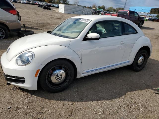 VOLKSWAGEN BEETLE 2014 with VIN 3VWHP7AT0EM617187 - Photo from auction