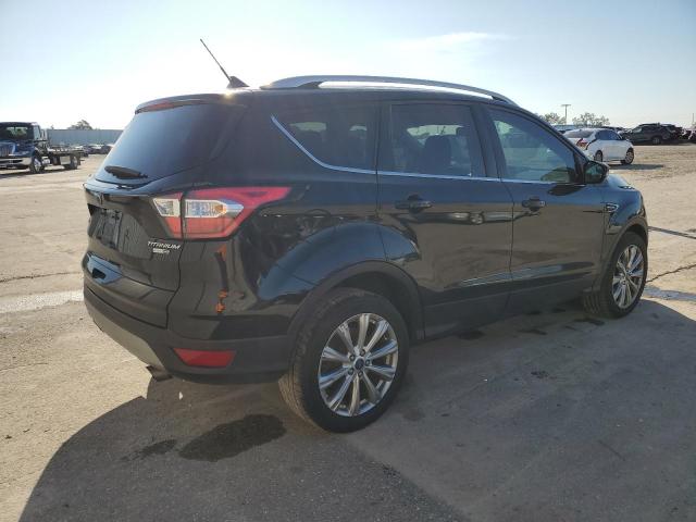 Photo 3 from auction – 2018 FORD ESCAPE TIT with VIN 1FMCU9J91JUB48294