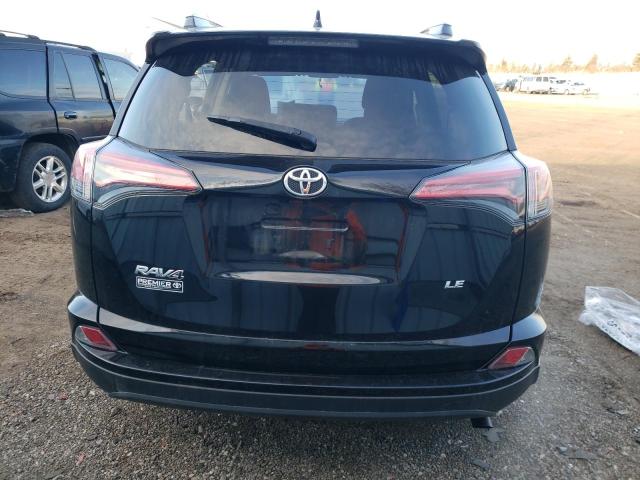 Photo 6 from auction – 2018 TOYOTA RAV4 LE with VIN 2T3ZFREV4JW513795