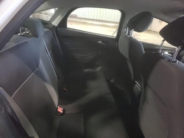 Foto 10 de la subasta – 2014 FORD FOCUS SE con VIN 1FADP3F26EL150777