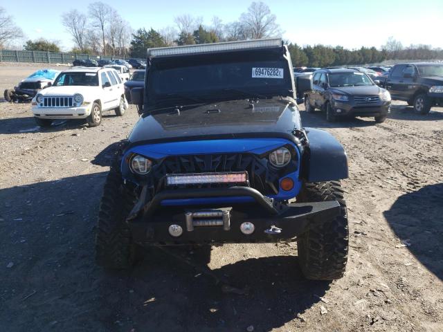 Photo 5 from auction – 2011 JEEP WRANGLER U with VIN 1J4BA5H15BL504927