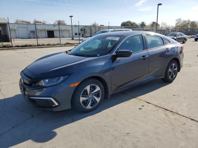 HONDA CIVIC LX 2020 with VIN 19XFC2F66LE207304 - Photo from auction