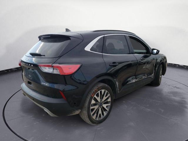 Photo 3 from auction – 2021 FORD ESCAPE TIT with VIN 1FMCU9J96MUA57817