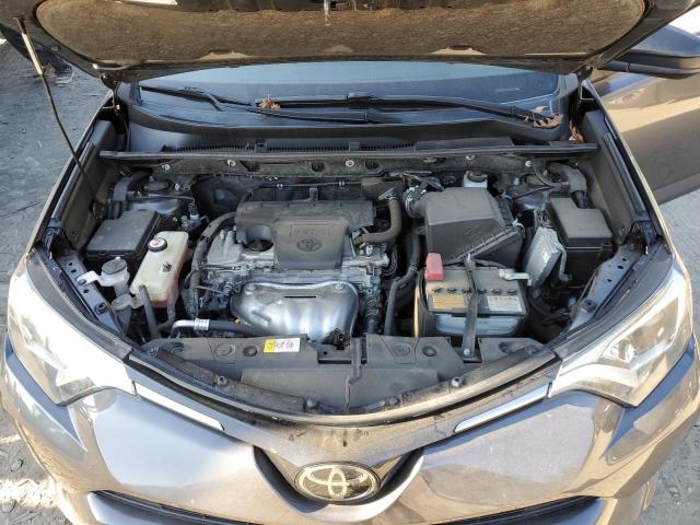Photo 11 from auction – 2018 TOYOTA RAV4 LE with VIN JTMBFREVXJJ730641