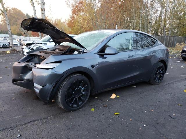 TESLA MODEL Y 2022 with VIN 7SAYGAEE7NF429351 - Photo from auction