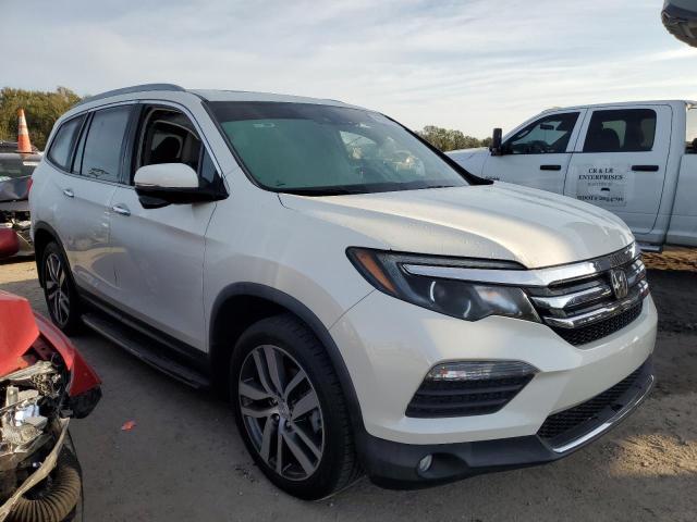 Photo 4 from auction – 2017 HONDA PILOT TOUR with VIN 5FNYF5H98HB021337