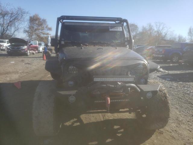 Photo 5 from auction – 2015 JEEP WRANGLER U with VIN 1C4BJWFG3FL559451