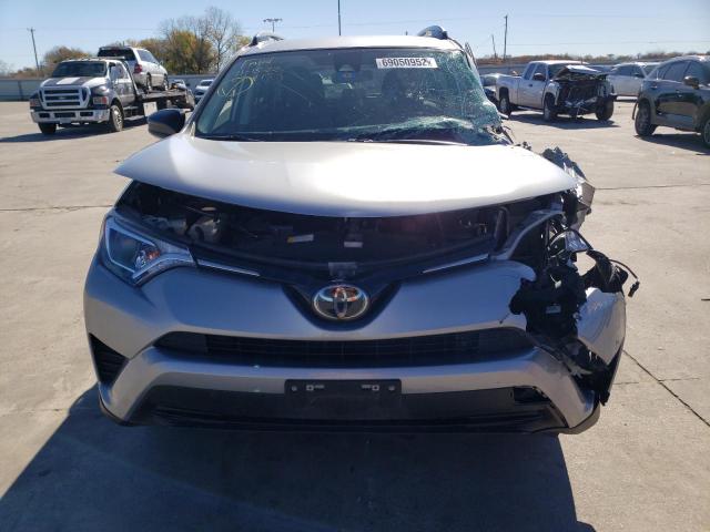 Photo 5 from auction – 2018 TOYOTA RAV4 LE with VIN 2T3ZFREVXJW469155