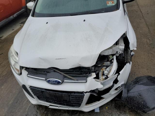 Photo 11 from auction – 2014 FORD FOCUS SE with VIN 1FADP3F25EL141553
