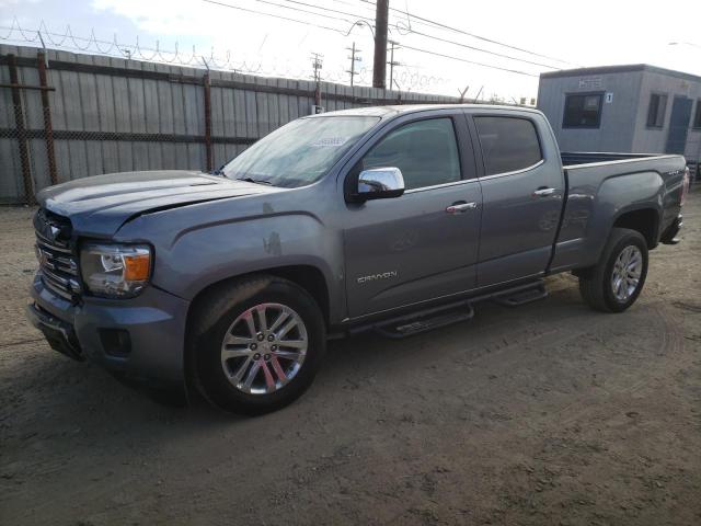 GMC CANYON SLT 2018 with VIN 1GTP6DE10J1121631 - Photo from auction