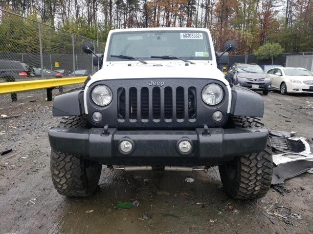 Photo 5 from auction – 2016 JEEP WRANGLER U with VIN 1C4BJWDG0GL160677