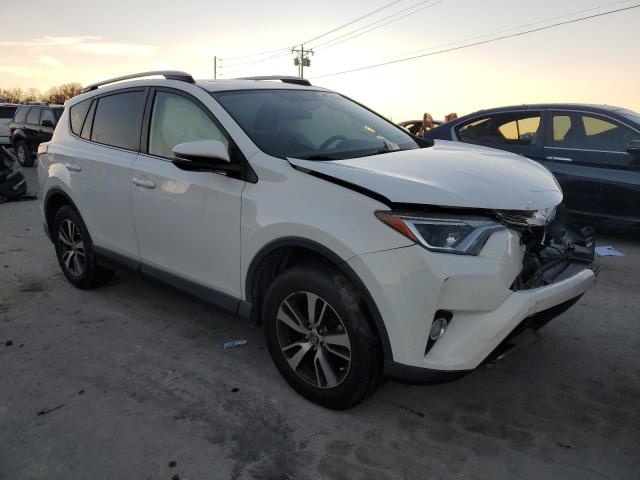 Photo 4 from auction – 2016 TOYOTA RAV4 XLE with VIN JTMWFREV4GJ080022