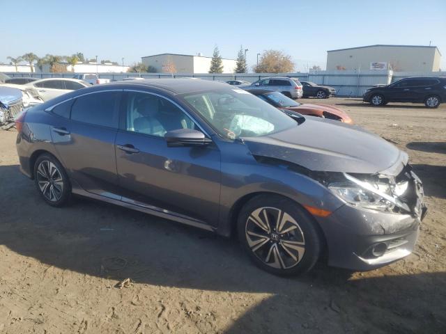 Photo 4 from auction – 2017 HONDA CIVIC EXL with VIN 2HGFC1F74HH657033
