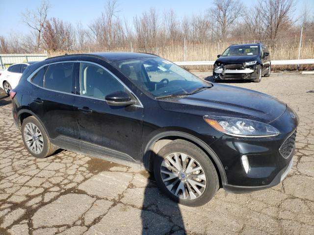 Photo 4 from auction – 2020 FORD ESCAPE TIT with VIN 1FMCU9J90LUB15001