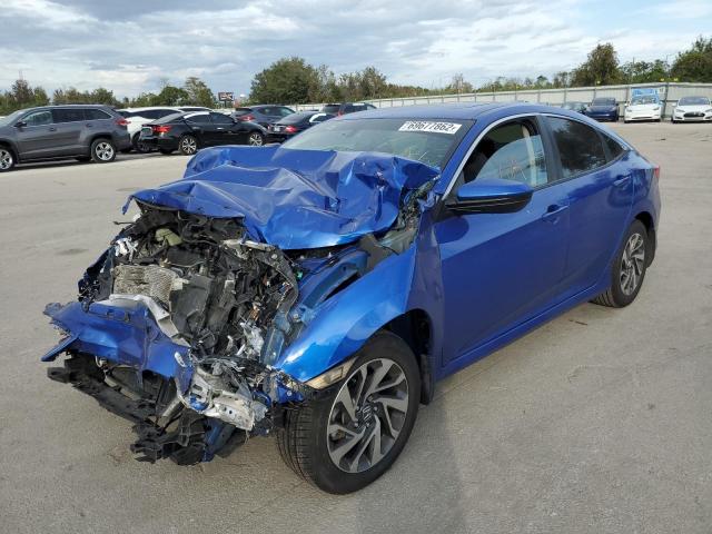 HONDA CIVIC EX 2018 with VIN 19XFC2F78JE032169 - Photo from auction