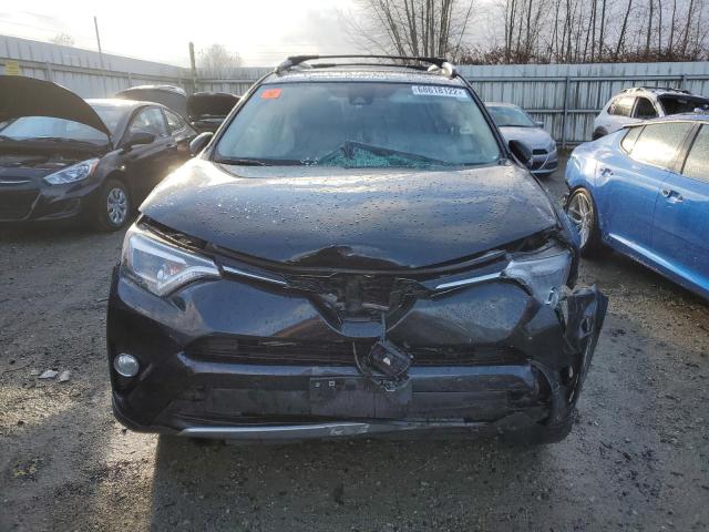 Photo 5 from auction – 2016 TOYOTA RAV4 HV LI with VIN JTMDJREV7GD016643