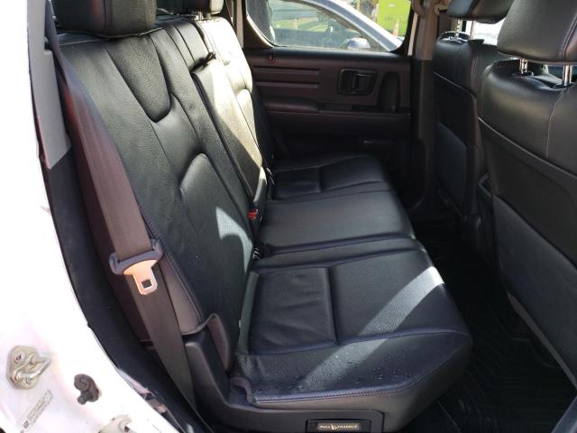 Photo 10 from auction – 2014 HONDA RIDGELINE with VIN 5FPYK1F68EB009897