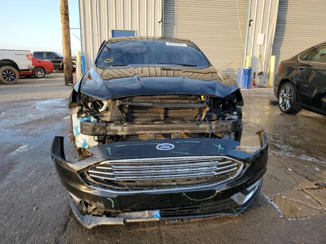 Photo 5 from auction – 2018 FORD FUSION TIT with VIN 3FA6P0D98JR192404
