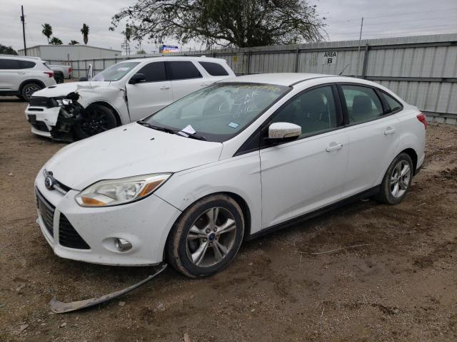 FORD FOCUS SE 2014 with VIN 1FADP3F21EL390402 - Photo from auction