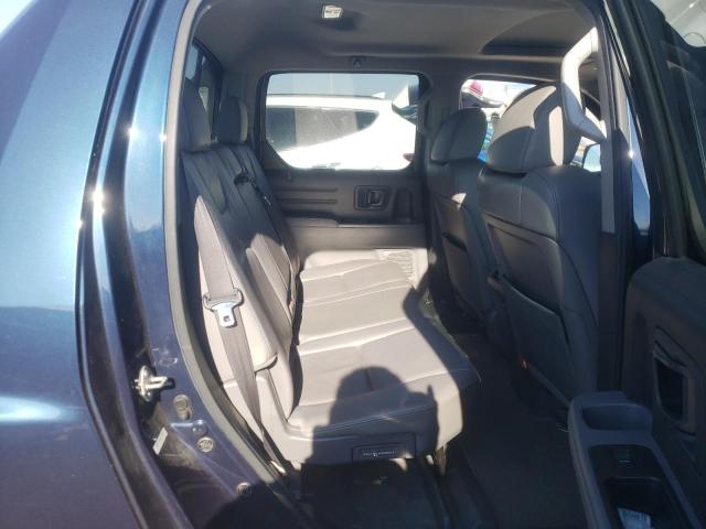 Photo 10 from auction – 2010 HONDA RIDGELINE with VIN 5FPYK1F51AB007815