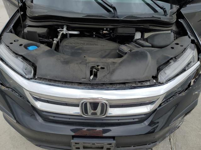Photo 12 from auction – 2021 HONDA PILOT LX with VIN 5FNYF5H16MB007196