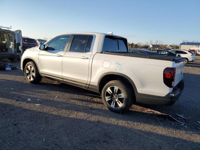 Photo 2 from auction – 2020 HONDA RIDGELINE with VIN 5FPYK3F50LB026693