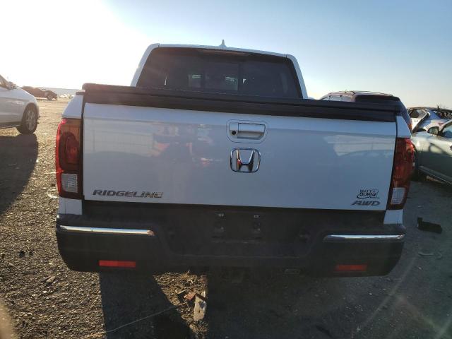 Photo 6 from auction – 2020 HONDA RIDGELINE with VIN 5FPYK3F50LB026693