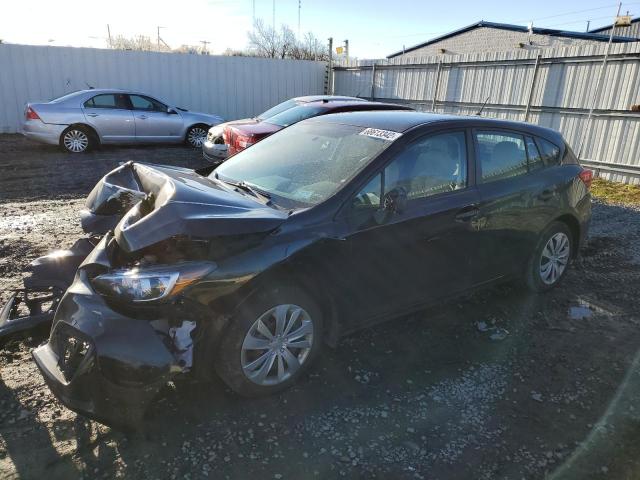 SUBARU IMPREZA 2019 with VIN 4S3GTAA62K3701154 - Photo from auction
