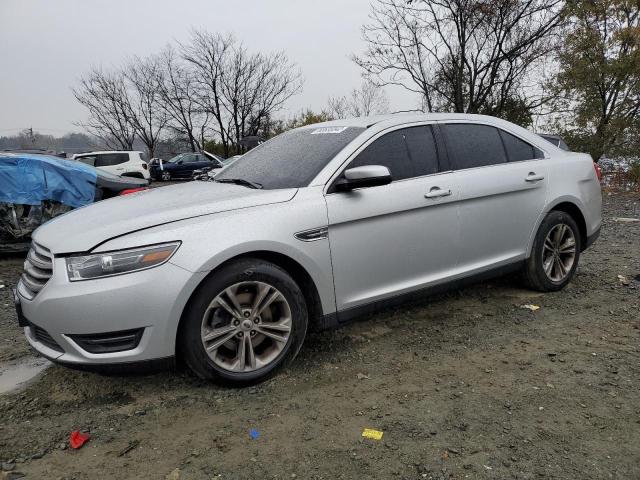 FORD TAURUS SEL 2018 with VIN 1FAHP2E86JG134969 - Photo from auction