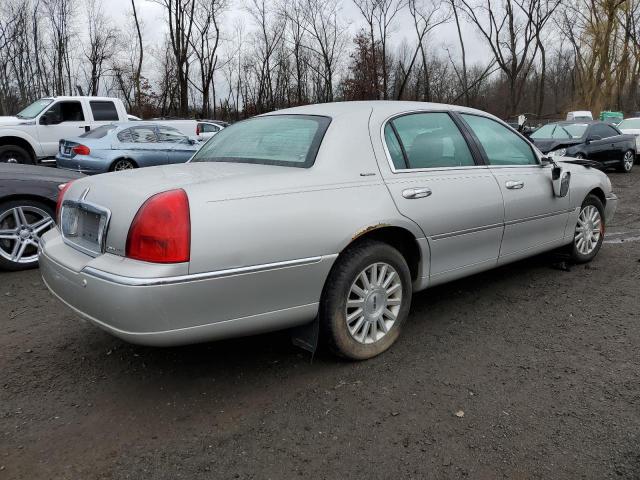 Photo 3 from auction – 2004 LINCOLN TOWN CAR E with VIN 1LNHM81W44Y619597