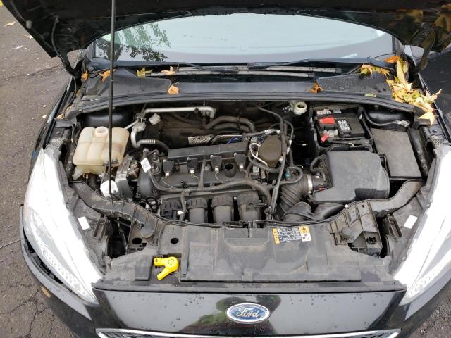 Photo 11 from auction – 2015 FORD FOCUS SE with VIN 1FADP3K20FL268010