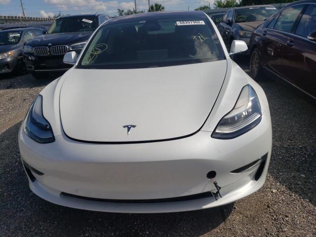 Photo 5 from auction – 2019 TESLA MODEL 3 with VIN 5YJ3E1EB2KF199751