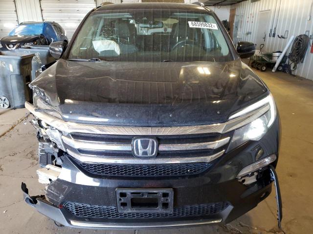 Photo 5 from auction – 2018 HONDA PILOT ELIT with VIN 5FNYF6H02JB031021