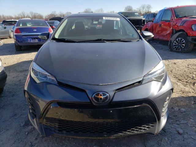 Photo 5 from auction – 2018 TOYOTA COROLLA with VIN 5YFBURHE3JP814605