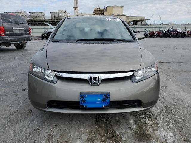 Photo 5 from auction – 2006 HONDA CIVIC LX with VIN 1HGFA16586L106902