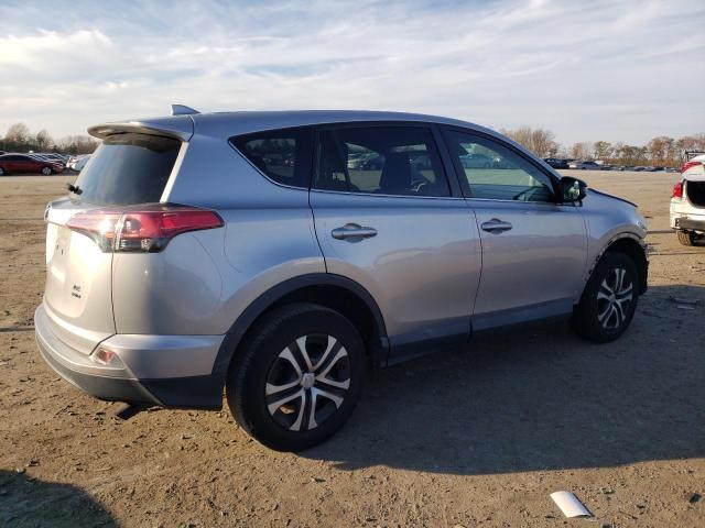 Photo 3 from auction – 2018 TOYOTA RAV4 LE with VIN 2T3BFREVXJW725103