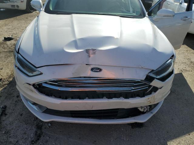 Photo 11 from auction – 2017 FORD FUSION SE with VIN 3FA6P0HD5HR226338