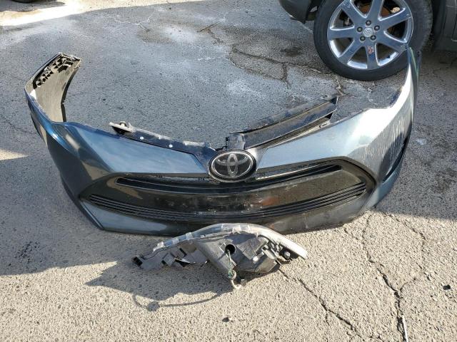 Photo 12 from auction – 2017 TOYOTA COROLLA LE with VIN 5YFBPRHEXHP698840