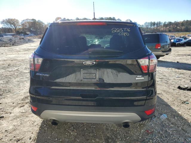 Photo 6 from auction – 2018 FORD ESCAPE SE with VIN 1FMCU0GD0JUA80271