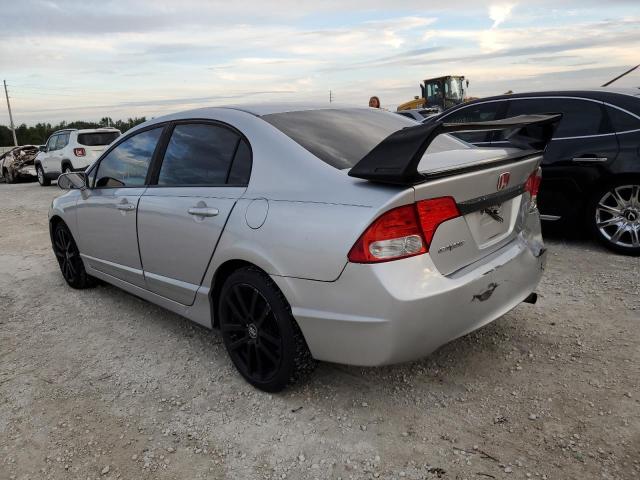 Photo 2 from auction – 2011 HONDA CIVIC LX with VIN 19XFA1F54BE030211