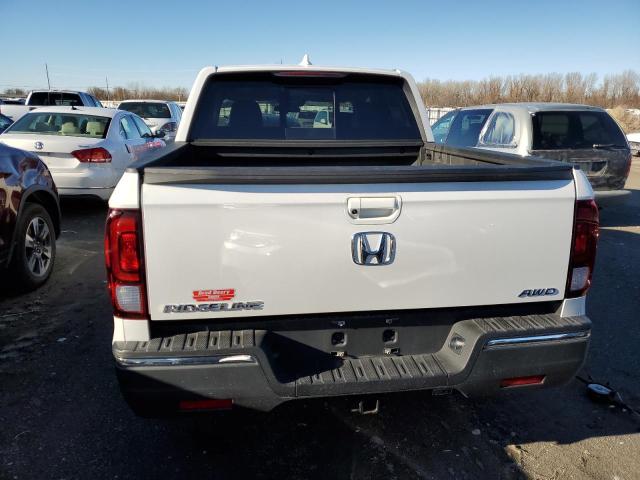 Photo 6 from auction – 2020 HONDA RIDGELINE with VIN 5FPYK3F53LB028664