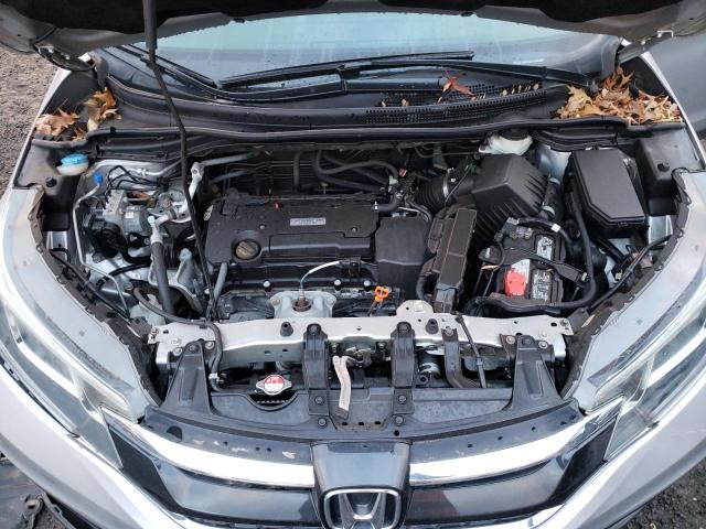 Photo 12 from auction – 2016 HONDA CR-V LX with VIN 5J6RM4H33GL094864