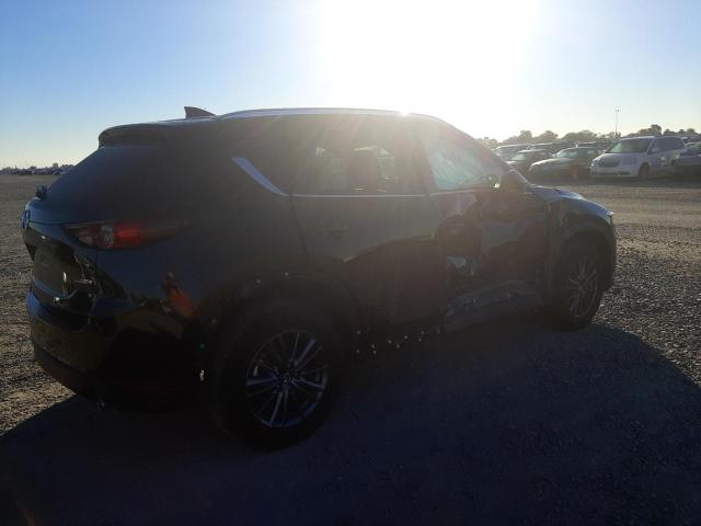 Photo 3 from auction – 2021 MAZDA CX-5 TOURI with VIN JM3KFACMXM1314418