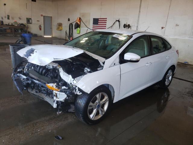 FORD FOCUS SE 2014 with VIN 1FADP3F20EL459922 - Photo from auction
