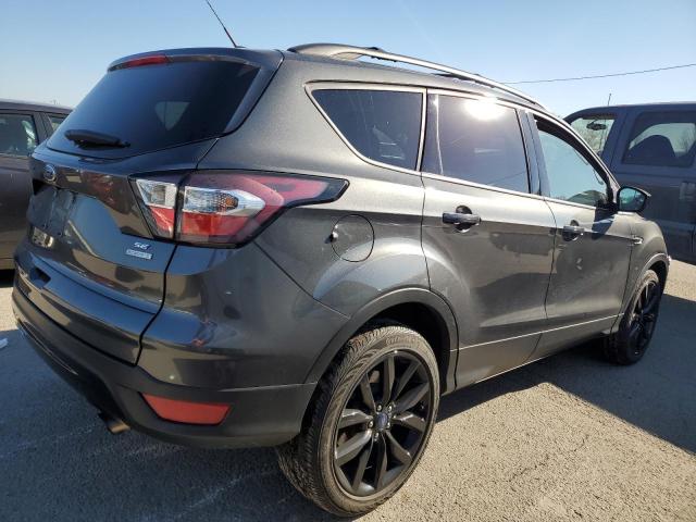 Photo 3 from auction – 2017 FORD ESCAPE SE with VIN 1FMCU0GDXHUE43377