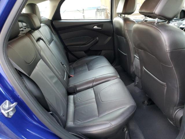 Foto 11 de la subasta – 2014 FORD FOCUS SE con VIN 1FADP3K27EL415048