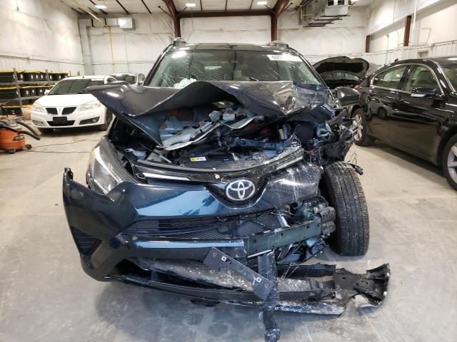 Photo 5 from auction – 2017 TOYOTA RAV4 LE with VIN JTMBFREV5HJ150837